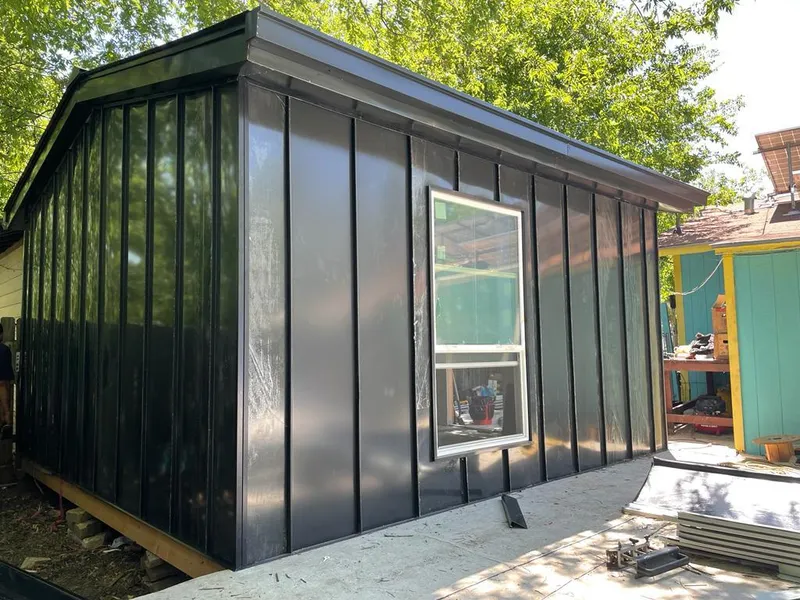 Black standing seam metal wall panels for Metal Roof Installation in Commerce City