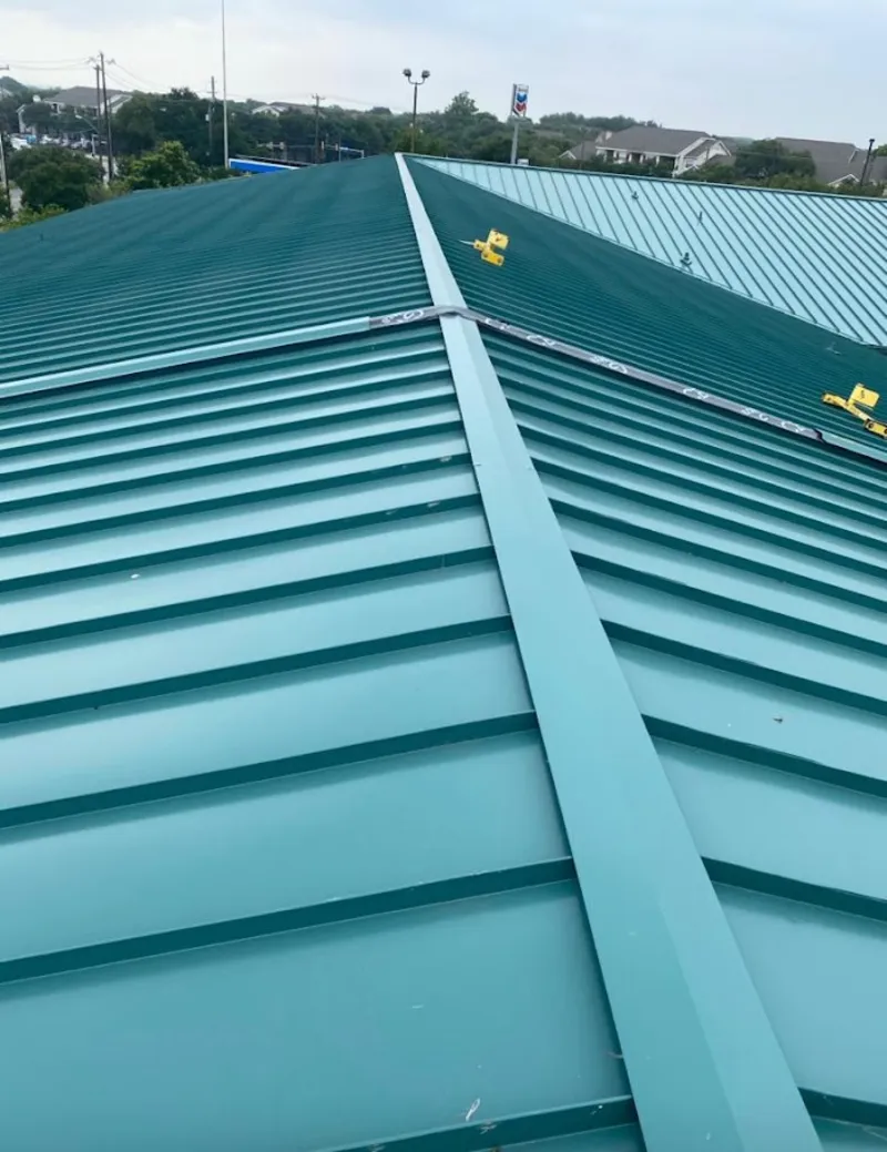 Green commercial metal roof ridge and valley for Metal Roof Repair in Commerce City
